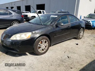 2006 Pontiac G6 6-Cyl z VIN 1G2ZG558964261504, wystawiony jako Copart lot #57126845 z przebiegiem 168 438 mil mil oraz Szkoda całkowita • Salvage title. Historia ofert i sprzedaży dostępna na DreamBid. Obrazek 1.
