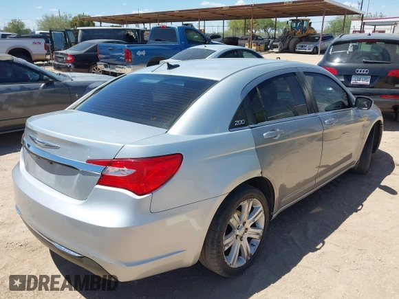 2012 Chrysler 200 LX with VIN 1C3CCBAB9CN318338, listed as a IAAI auction lot 42116991 with 106,572 mi miles and . Bid and sale history available at DreamBid. Image 4.