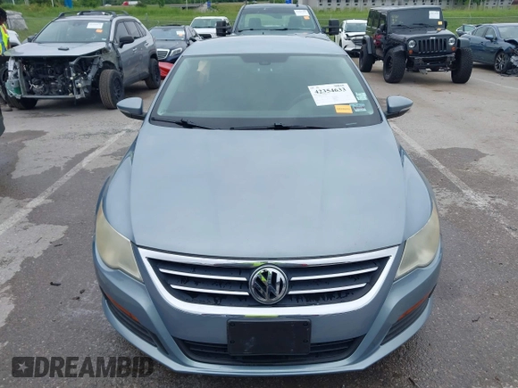 2012 Volkswagen CC Sport z VIN WVWMN7AN3CE520836, wystawiony jako IAAI lot #42354633 z przebiegiem 152 357 mil mil oraz . Historia ofert i sprzedaży dostępna na DreamBid. Obrazek 13.