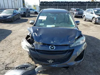 2013 Mazda 5 Sport z VIN JM1CW2BL3D0155694, wystawiony jako IAAI lot #41641169 z przebiegiem Nie podano mil oraz . Historia ofert i sprzedaży dostępna na DreamBid. Obrazek 11.