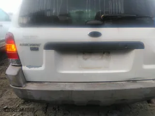 2001 Ford Escape XLT with VIN 1FMYU03171KE99182, listed as a IAAI auction lot 40856356 with 176,540 mi miles. Bid and sale history available at carsss.com. Image 12.