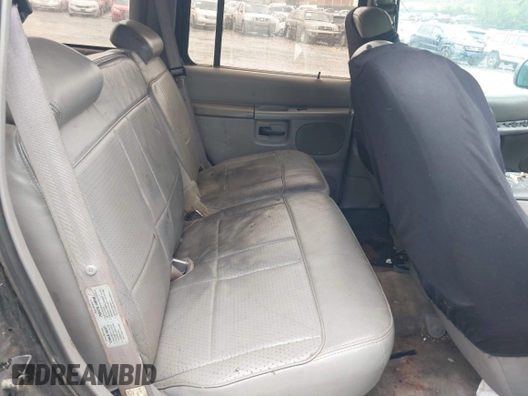 1997 Mercury Mountaineer z VIN 4M2DU55P5VUJ44923, wystawiony jako IAAI lot #42263688 z przebiegiem 146 159 mil mil oraz . Historia ofert i sprzedaży dostępna na DreamBid. Obrazek 8.