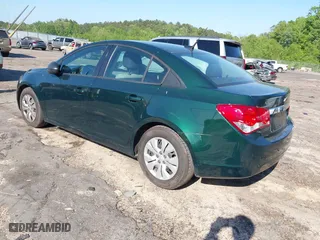 2014 Chevrolet Cruze LS with VIN 1G1PA5SG7E7441375, listed as a IAAI auction lot 42031209 with 104,720 mi miles. Bid and sale history available at carsss.com. Image 3.