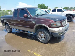2001 Ford F-150 XL z VIN 1FTRX18LX1NA46219, wystawiony jako IAAI lot #42325852 z przebiegiem Nie podano mil oraz . Historia ofert i sprzedaży dostępna na DreamBid. Obrazek 1.