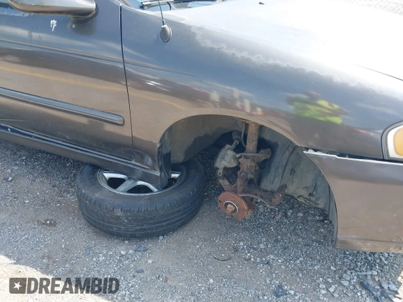 2001 Nissan Sentra SE z VIN 3N1BB51D61L127666, wystawiony jako IAAI lot #42400126 z przebiegiem 190 345 mil mil oraz . Historia ofert i sprzedaży dostępna na DreamBid. Obrazek 6.