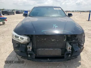2015 BMW 4 Series 428i z VIN WBA4A5C54FG051212, wystawiony jako Copart lot #59479495 z przebiegiem 126 497 mil mil oraz Szkoda całkowita • Salvage title. Historia ofert i sprzedaży dostępna na DreamBid. Obrazek 5.