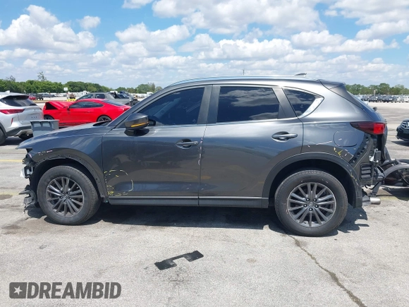 2020 Mazda CX-5 Touring with VIN JM3KFACM9L0826742, listed as a IAAI auction lot 41903755 with 73,409 mi miles and . Bid and sale history available at DreamBid. Image 15.