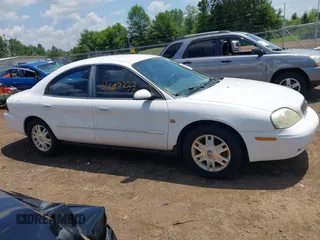 2005 Mercury Sable LS z VIN 1MEFM55S25A621939, wystawiony jako IAAI lot #42607222 z przebiegiem 237 492 mil mil oraz . Historia ofert i sprzedaży dostępna na DreamBid. Obrazek 13.