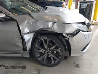 2021 Honda Civic Sport with VIN 2HGFC2F83MH521470, listed as a IAAI auction lot 41828890 with 49,703 mi miles and . Bid and sale history available at DreamBid. Image 6.