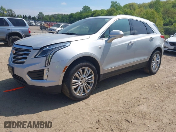 2017 Cadillac XT5 Premium Luxury AWD z VIN 1GYKNERS6HZ112170, wystawiony jako IAAI lot #42262116 z przebiegiem 140 982 mil mil oraz . Historia ofert i sprzedaży dostępna na DreamBid. Obrazek 17.