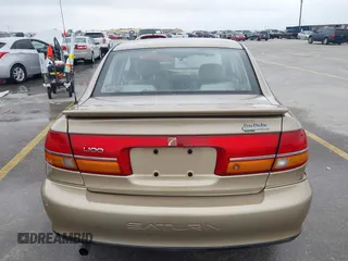 2002 Saturn LS z VIN 1G8JS54F02Y543678, wystawiony jako IAAI lot #42213978 z przebiegiem 132 755 mil mil oraz . Historia ofert i sprzedaży dostępna na DreamBid. Obrazek 16.