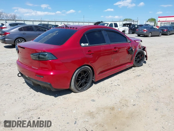 2008 Mitsubishi Lancer Evolution GSR with VIN JA3AW86V38U050561, listed as a IAAI auction lot 41879629 with 104,905 mi miles. Bid and sale history available at carsss.com. Image 4.