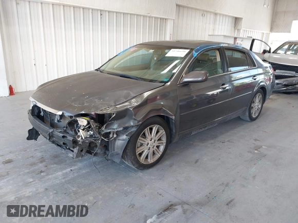 2009 Toyota Avalon XL with VIN 4T1BK36B19U348758, listed as a IAAI auction lot 39746698 with 141,454 mi miles and . Bid and sale history available at DreamBid. Image 2.