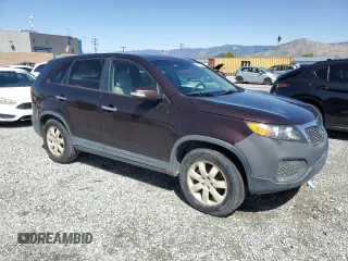 2012 Kia Sorento LX with VIN 5XYKT3A14CG189971, listed as a Copart auction lot 50820575 with 169,498 mi miles and Clean Title. Bid and sale history available at DreamBid. Image 4.