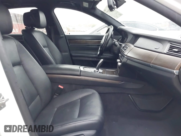 2013 BMW 7 Series 740i with VIN WBAYA6C57DC995338, listed as a IAAI auction lot 41479077 with 123,680 mi miles and . Bid and sale history available at DreamBid. Image 5.