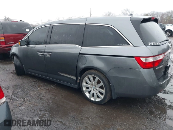 2012 Honda Odyssey Touring with VIN 5FNRL5H98CB089871, listed as a IAAI auction lot 41351447 with 999,999 mi miles. Bid and sale history available at carsss.com. Image 13.