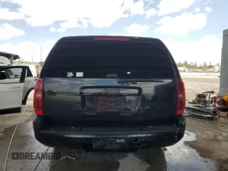 2013 Chevrolet Suburban LT with VIN 1GNSCJE00DR300449, listed as a Copart auction lot 55134455 with 301,552 mi miles and Salvage title. Bid and sale history available at DreamBid. Image 6.