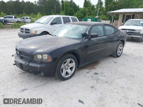 2009 Dodge Charger Police with VIN 2B3KA43T49H548564, listed as a IAAI auction lot 42088692 with 202,786 mi miles and . Bid and sale history available at carsss.com. Image 2.