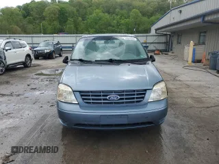 2005 Ford Freestar SE z VIN 2FMDA51605BA50204, wystawiony jako Copart lot #56002955 z przebiegiem 212 942 mil mil oraz Szkody całkowita. Historia ofert i sprzedaży dostępna na DreamBid. Obrazek 5.