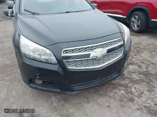 2013 Chevrolet Malibu LTZ with VIN 1G11H5SA1DF123107, listed as a IAAI auction lot 41470772 with 202,752 mi miles. Bid and sale history available at carsss.com. Image 6.