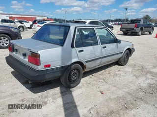 1986 Toyota Corolla с VIN JT2AE82E7G3318230, выставлен на аукционе IAAI как лот 42042219 с пробегом 74 689 миль миль и . История ставок и продаж доступна на DreamBid. Изображение 4.