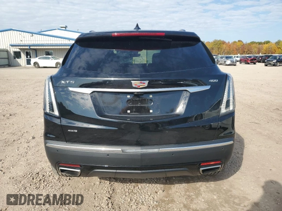 2021 Cadillac XT5 AWD Sport with VIN 1GYKNHRS3MZ103180, listed as a Copart auction lot 77166714 with 17,659 mi miles and Salvage title. Bid and sale history available at DreamBid. Image 6.
