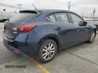 2015 Mazda 3 i Touring with VIN 3MZBM1L73FM145189, listed as a Copart auction lot 59802275 with 84,625 mi miles and Salvage title. Bid and sale history available at DreamBid. Image 3.