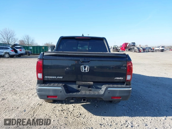 2019 Honda Ridgeline RTL-E with VIN 5FPYK3F7XKB033652, listed as a IAAI auction lot 41751421 with 96,774 mi miles and . Bid and sale history available at DreamBid. Image 15.