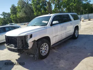2015 Chevrolet Suburban LT with VIN 1GNSCJKC2FR738634, listed as a Copart auction lot 53527545 with 259,856 mi miles and Salvage Title. Bid and sale history available at carsss.com. Image 1.