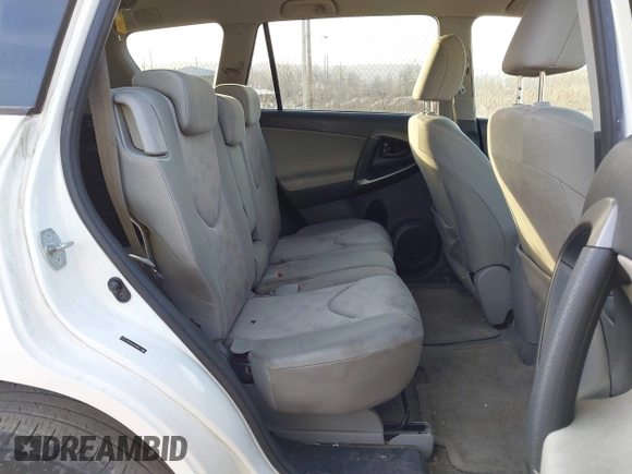 2009 Toyota RAV4 with VIN JTMBF33VX9D001291, listed as a IAAI auction lot 41792376 with 104,318 mi miles and . Bid and sale history available at DreamBid. Image 8.