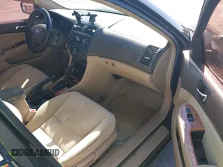 2005 Honda Accord EX z VIN 1HGCM56715A171751, wystawiony jako IAAI lot #41749592 z przebiegiem 166 393 mil mil oraz . Historia ofert i sprzedaży dostępna na DreamBid. Obrazek 5.