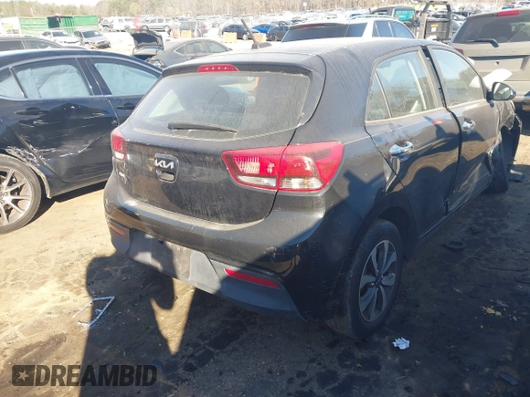 2022 Kia Rio S with VIN 3KPA25AD8NE443590, listed as a IAAI auction lot 41684325 with 73,231 mi miles and . Bid and sale history available at DreamBid. Image 4.