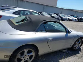 1999 Porsche 911 with VIN WP0CA2999XS652816, listed as a IAAI auction lot 41975822 with 291,258 mi miles and . Bid and sale history available at DreamBid. Image 13.