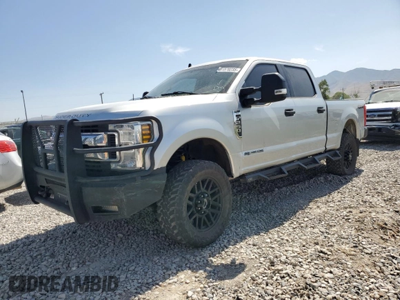 2019 Ford F-250 XL with VIN 1FT7W2BT0KEC17148, listed as a Copart auction lot 61570235 with 101,065 mi miles and Salvage title. Bid and sale history available at DreamBid. Image 1.