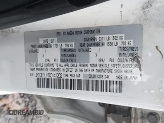 2012 Mazda 2 Touring z VIN JM1DE1LY4C0141202, wystawiony jako IAAI lot #41051663 z przebiegiem 160 364 mil mil oraz . Historia ofert i sprzedaży dostępna na DreamBid. Obrazek 9.