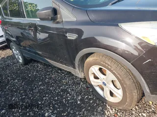 2013 Ford Escape SE with VIN 1FMCU0GX1DUD14741, listed as a IAAI auction lot 42481501 with Not provided miles and . Bid and sale history available at DreamBid. Image 6.