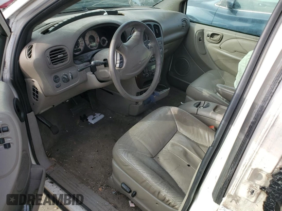 2001 Chrysler Town & Country LXi with VIN 2C8GP54L11R402563, listed as a Copart auction lot 86108164 with 179,021 mi miles and Salvage Title. Bid and sale history available at DreamBid. Image 8.