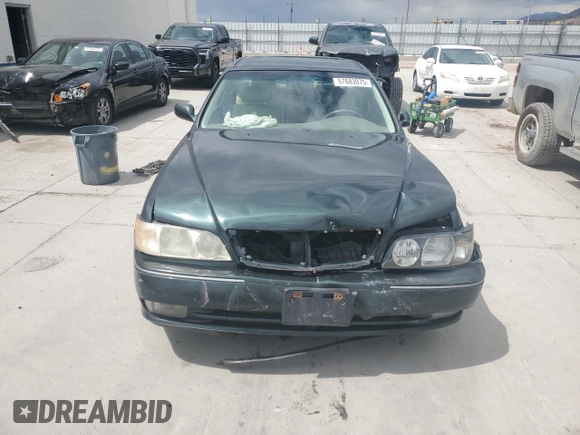 1999 Infiniti Q45 z VIN JNKBY31A6XM600579, wystawiony jako Copart lot #57683075 z przebiegiem 215 415 mil mil oraz Szkoda całkowita • Salvage title. Historia ofert i sprzedaży dostępna na DreamBid. Obrazek 5.