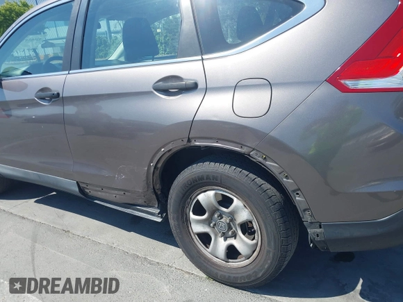 2013 Honda CR-V LX with VIN 3CZRM3H34DG705066, listed as a IAAI auction lot 42661478 with 318,027 mi miles and . Bid and sale history available at DreamBid. Image 6.