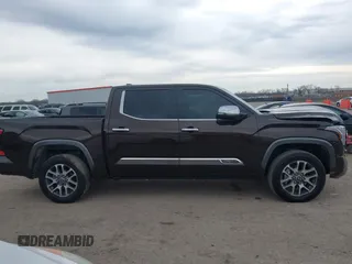 2023 Toyota Tundra 1794 Edition with VIN 5TFMA5AB1PX021419, listed as a IAAI auction lot 41359917 with 41,258 mi miles and . Bid and sale history available at DreamBid. Image 13.