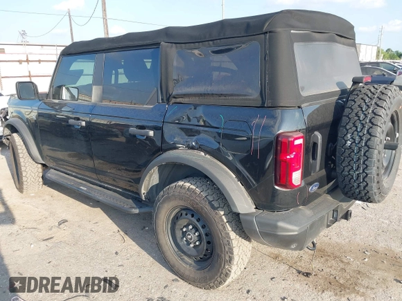 2022 Ford Bronco z VIN 1FMEE5BP3NLA74562, wystawiony jako IAAI lot #42338666 z przebiegiem 20 743 mil mil oraz . Historia ofert i sprzedaży dostępna na DreamBid. Obrazek 3.