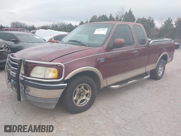 1998 Ford F-150 XL with VIN 1FTRX17L9WKA93669, listed as a IAAI auction lot 41531304 with 174,614 mi miles and . Bid and sale history available at DreamBid. Image 2.