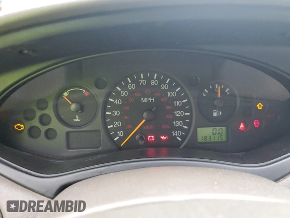 2004 Ford Focus ZTW with VIN 1FAFP35Z84W203676, listed as a Copart auction lot 57272835 with 183,115 mi miles and Salvage title. Bid and sale history available at DreamBid. Image 9.