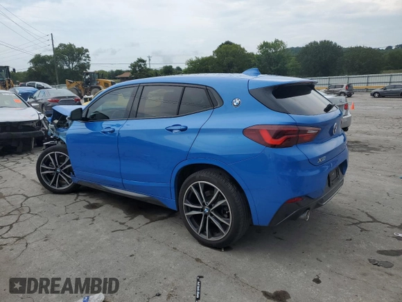 2023 BMW X2 sDrive28i with VIN WBXYH9C08P5V32303, listed as a Copart auction lot 64951994 with 22,462 mi miles and Salvage Title. Bid and sale history available at carsss.com. Image 2.