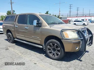 2005 Nissan Titan LE with VIN 1N6AA07B95N508001, listed as a IAAI auction lot 42656008 with 196,542 mi miles and . Bid and sale history available at DreamBid. Image 1.