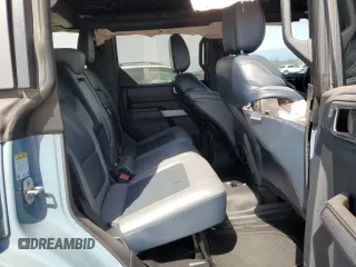 2023 Ford Bronco z VIN 1FMEE5BP6PLA96896, wystawiony jako Copart lot #50377215 z przebiegiem 29 407 mil mil oraz Szkoda całkowita • Salvage title. Historia ofert i sprzedaży dostępna na DreamBid. Obrazek 11.