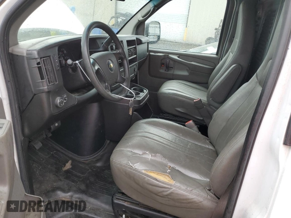2014 Chevrolet Express Cargo Van with VIN 1GCWGGBA1E1193958, listed as a Copart auction lot 77208494 with 126,193 mi miles and Clean Title. Bid and sale history available at carsss.com. Image 7.