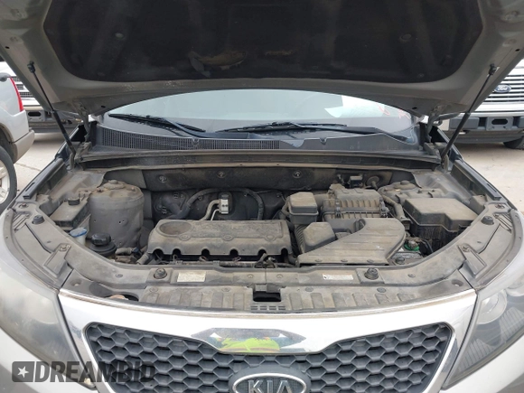 2012 Kia Sorento LX z VIN 5XYKT3A17CG295038, wystawiony jako IAAI lot #42294463 z przebiegiem 185 089 mil mil oraz . Historia ofert i sprzedaży dostępna na DreamBid. Obrazek 10.
