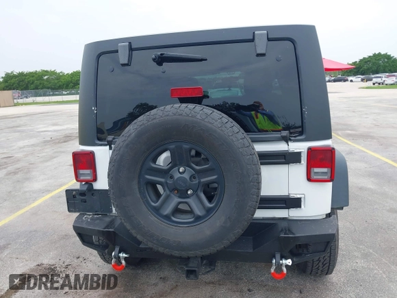 2018 Jeep Wrangler Unlimited Sport S with VIN 1C4BJWDG7JL895132, listed as a IAAI auction lot 42435993 with 71,394 mi miles and . Bid and sale history available at DreamBid. Image 16.