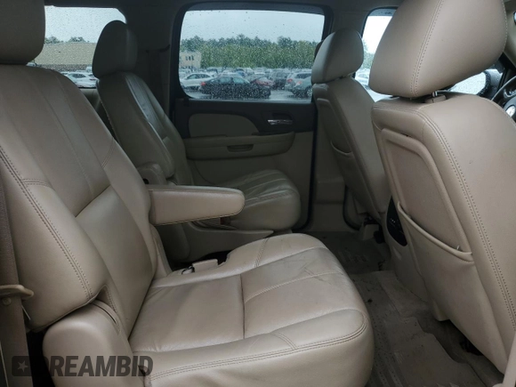 2011 Chevrolet Suburban LT z VIN 1GNSKJE39BR161772, wystawiony jako Copart lot #57075955 z przebiegiem Nie podano mil oraz Czysty tytuł • Clean title. Historia ofert i sprzedaży dostępna na DreamBid. Obrazek 11.